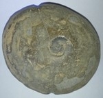 Fishing weight with fossil