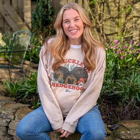 Maddie Moate wearing a "Prickle of Hedgehogs" jumper 